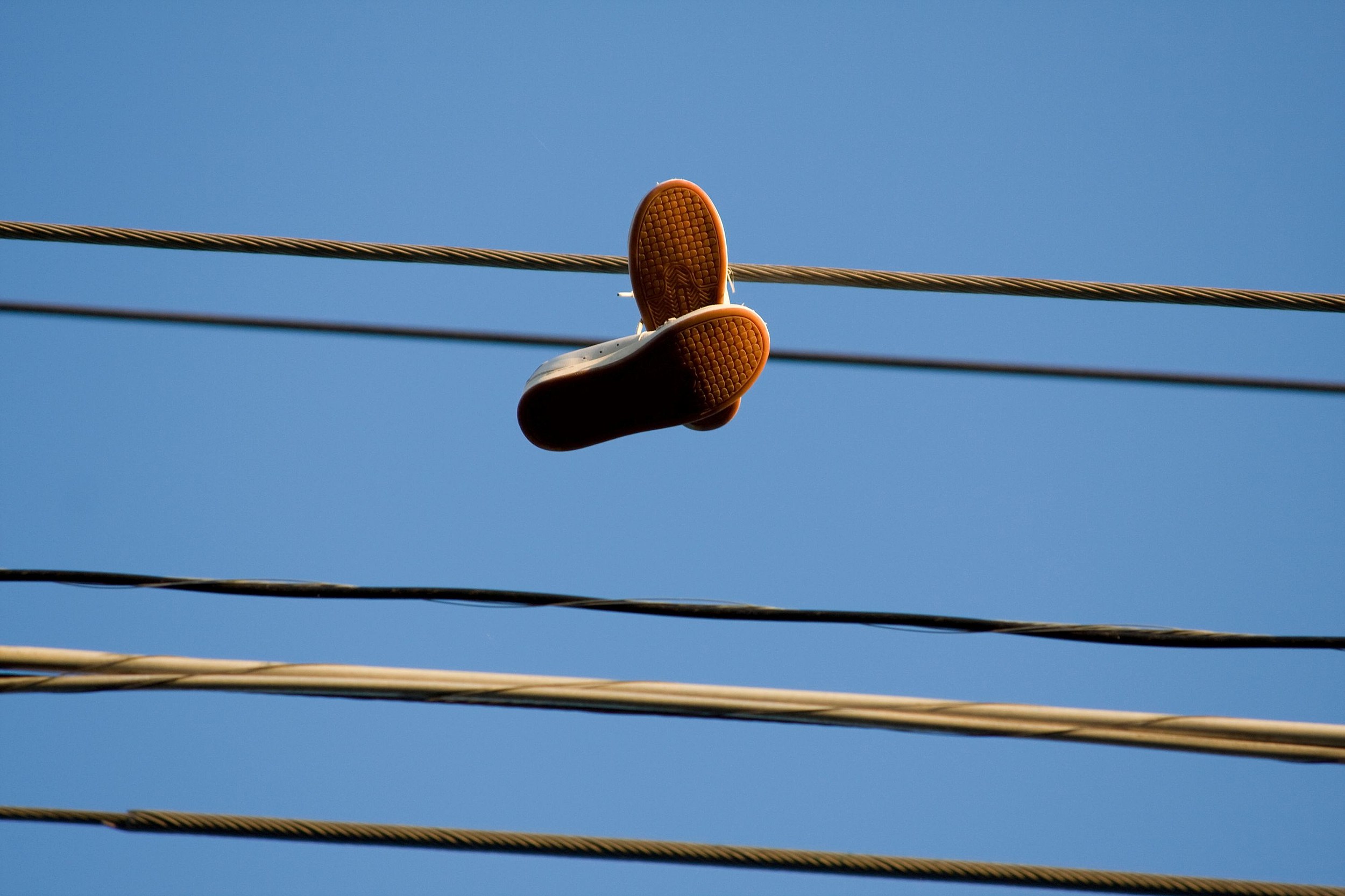 Shoes on Power Lines